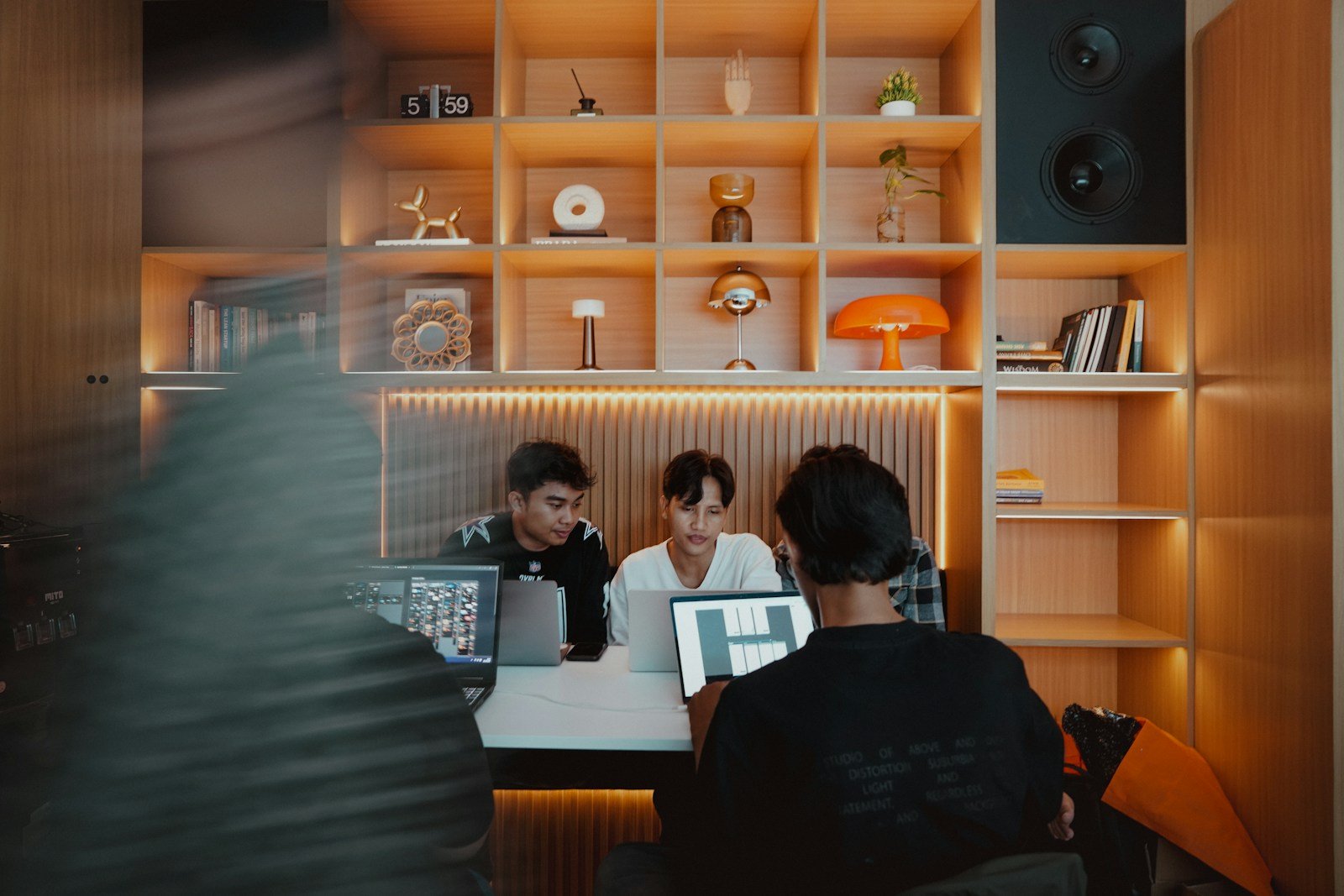 Designers collaborating in a creative studio workspace